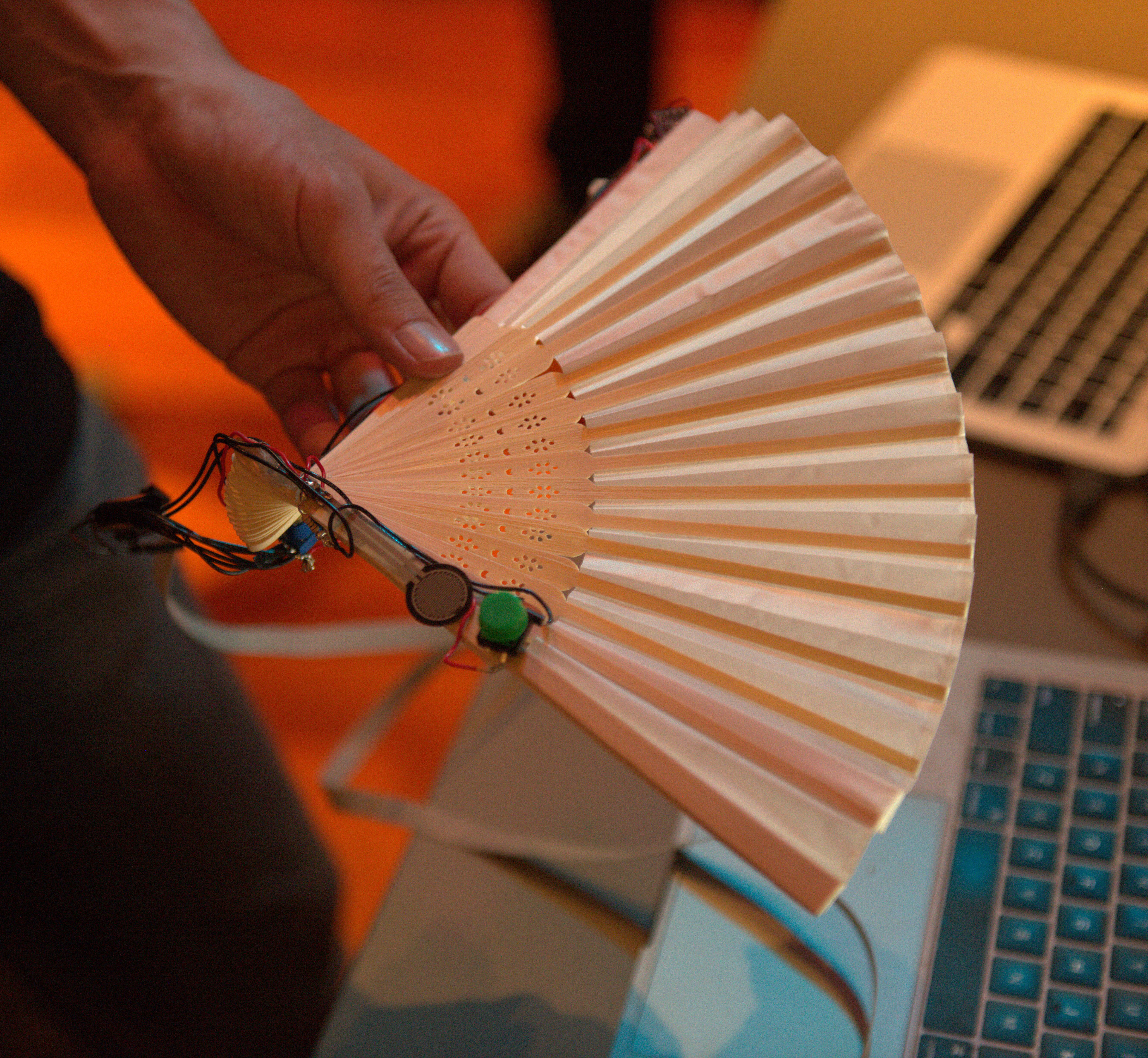 Hand fan instrument with sensors and wiring